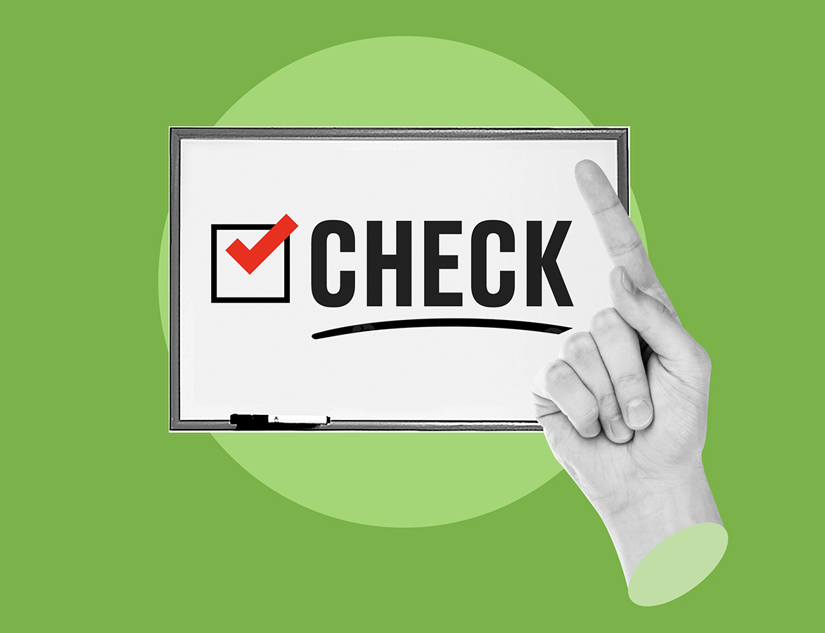 hand pointing to checkmark and word check